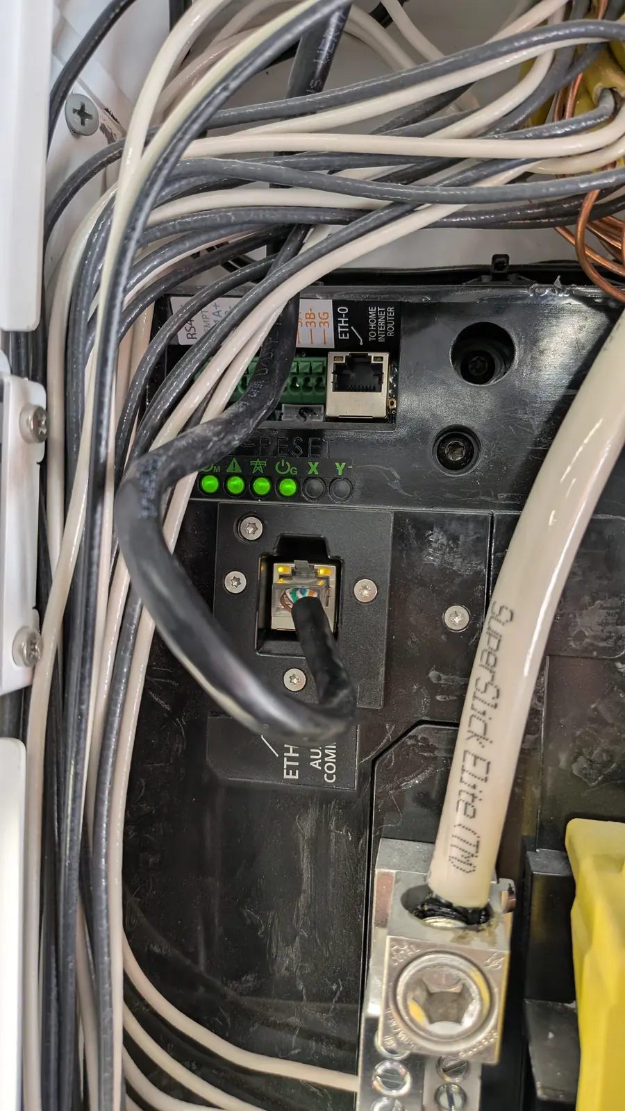 Network demarcation panel with link lights and organized incoming cabling